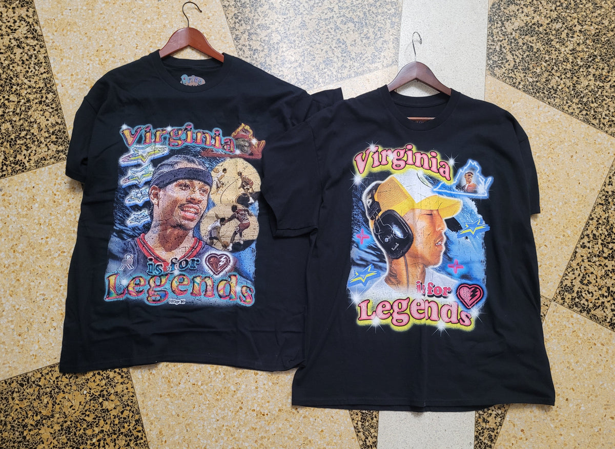 Two black t-shirts with colorful graphics and text on a textured floor. Virginia is for legends Swapmeet RVA