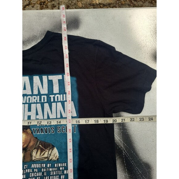Black Rihanna Travis Scott Anti tour 2016 t-shirt with graphic print and measuring tape on flat surface