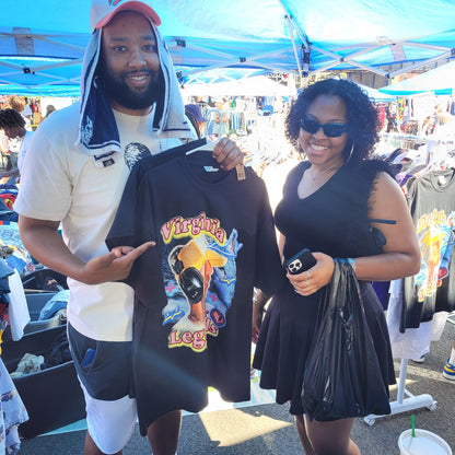 Man holding Virginia Is for Legends Y2k P tee with colorful graphic design at outdoor market