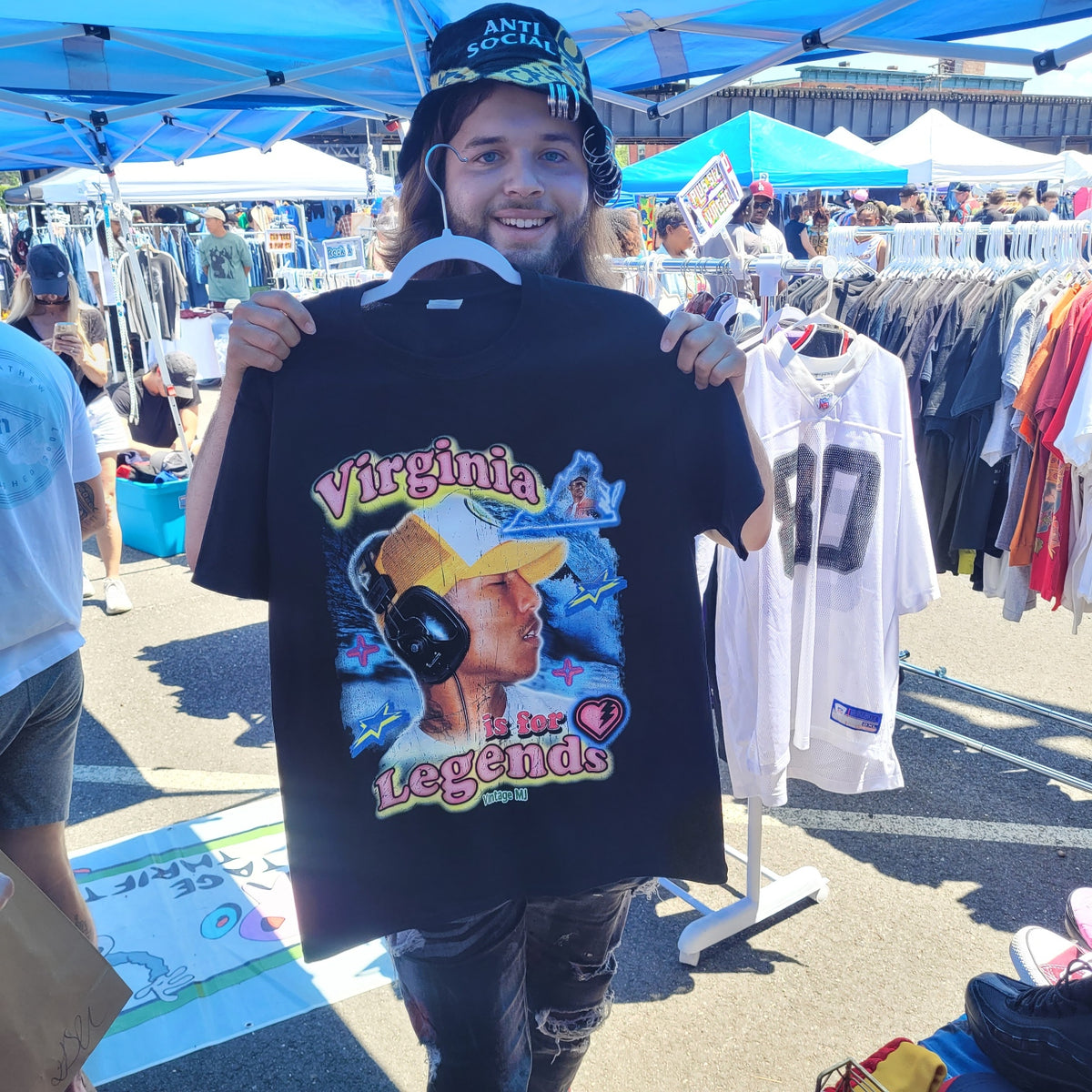 Customer  holding Virginia Is for Legends Y2k P tee black graphic t-shirt at Swapmeet Vintage market