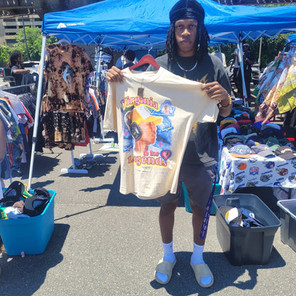 Person holding Virginia Is for Legends Y2k P tee at outdoor thrift market by Retro Vintage Thrift Swapmeet VTG market