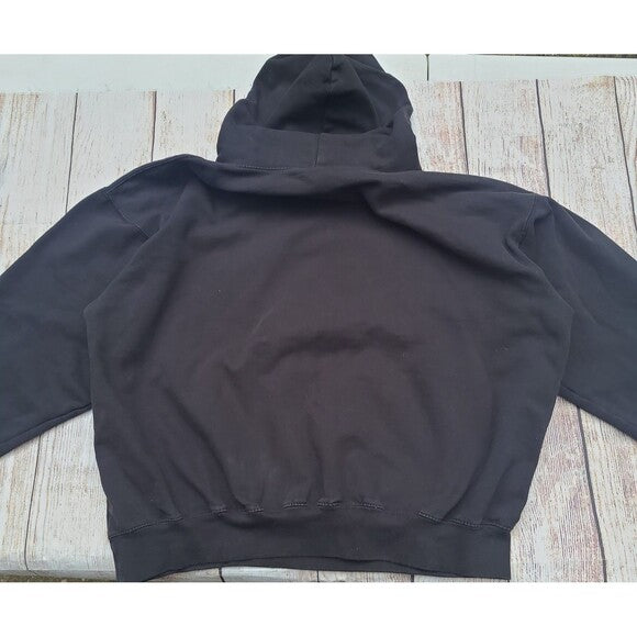 Back view of Y2K Slipknot Graphic Hoodie in black with a hood and long sleeves by RetroVintage Thrift