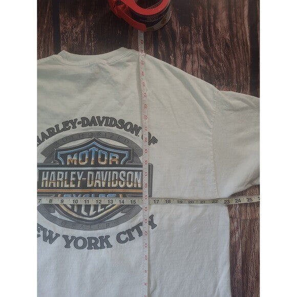 Vintage Harley Davidson NYC shirt New York white tee with large logo and measuring tape on wooden background