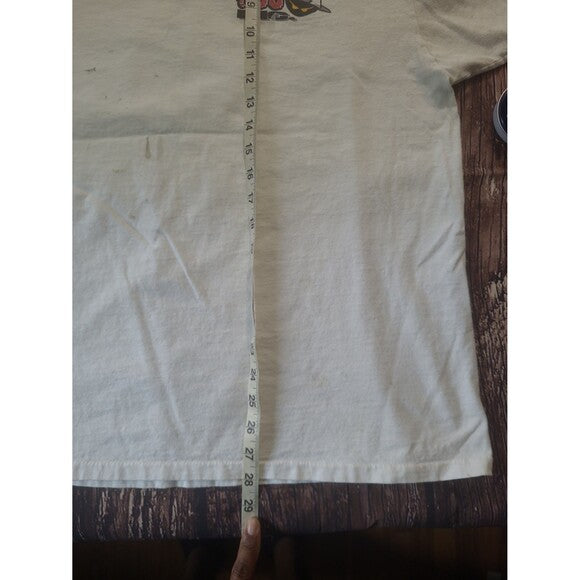 Vintage Open A Can of Whoop Inc humor shirt laid flat with measuring tape showing length