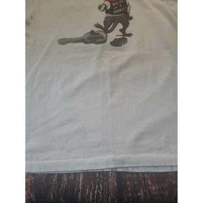 Close-up of hem and partial graphic on Vintage The Hackers single stitch Screen Stars band tee