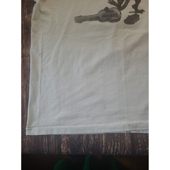 Close-up of Vintage The Hackers single stitch Screen Stars band tee showing hem and fabric texture