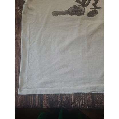 Close-up of Vintage The Hackers single stitch Screen Stars band tee showing hem and fabric texture