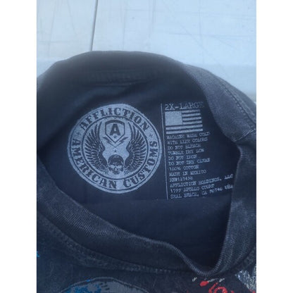 Close-up label of RetroVintage Thrift Vintage Y2K Affliction T-Shirt showing size and care instructions